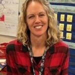 female blonde hair red and black plaid shirt