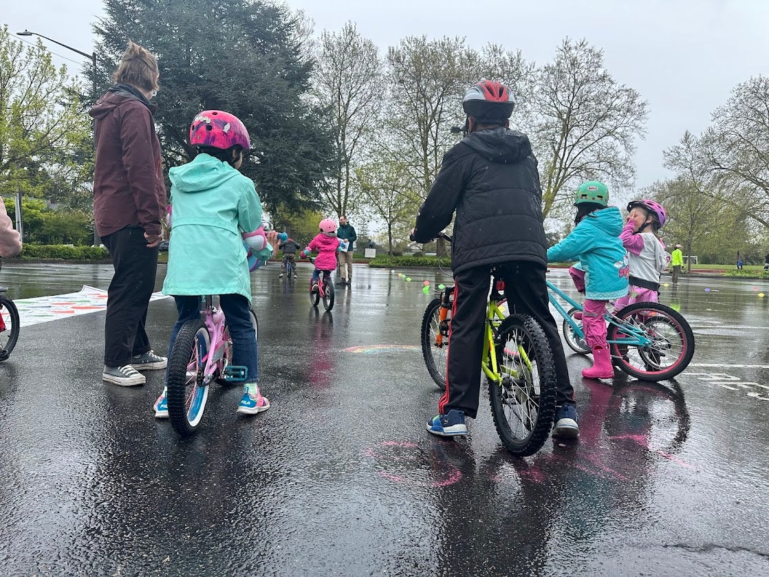 Students on bikes in Dunlap Elementary parking lot.