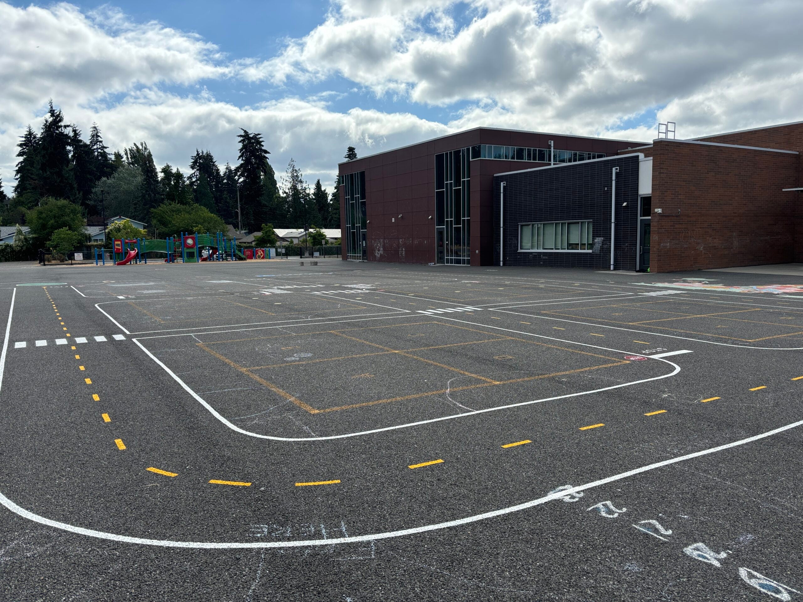 Miniature road painted on blacktop.