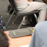 cell phone pouch in a classroom