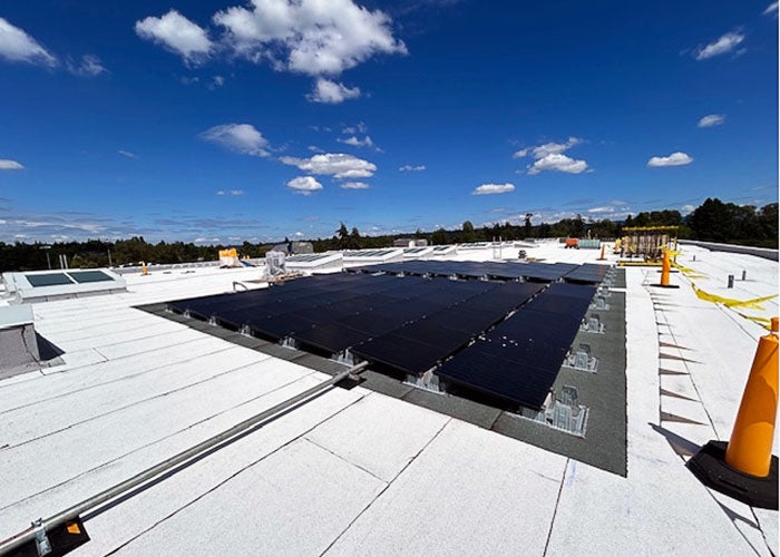 a roof with a very large solar panel