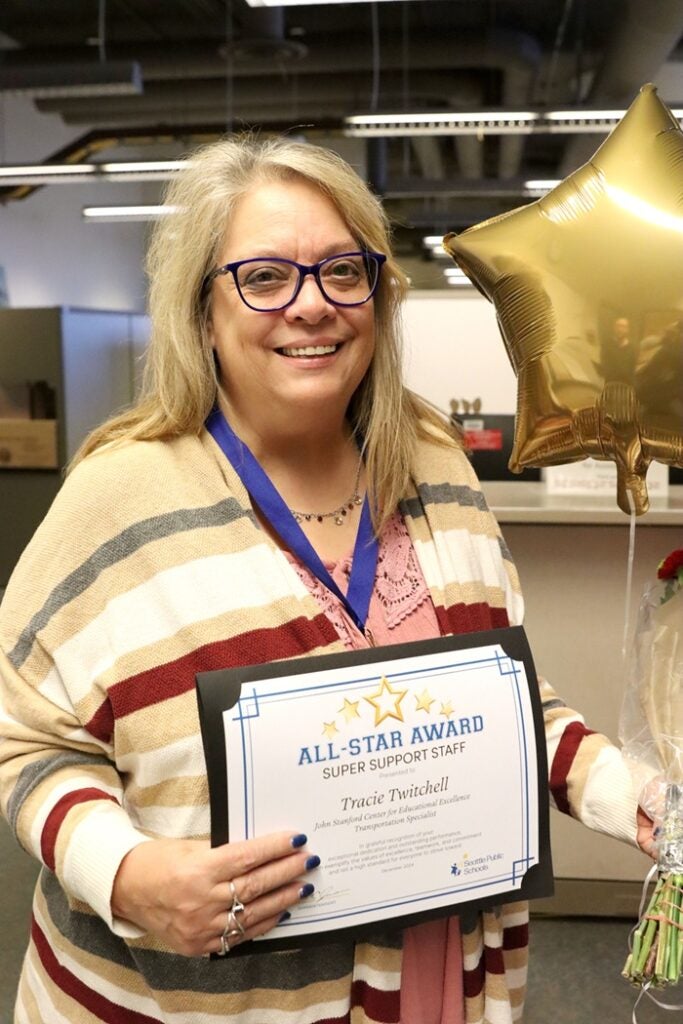 Transportation specialist Tracie Twitchell coordinates transportation for all eligible students, including those receiving McKinney-Vento/foster care or special education services.