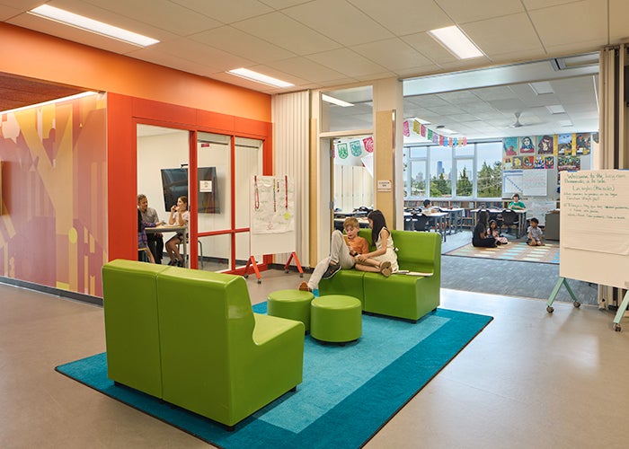 learning commons between two classrooms with large door open to classroom