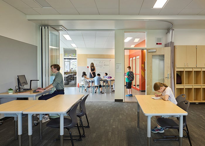 classroom with large open door to learning commons