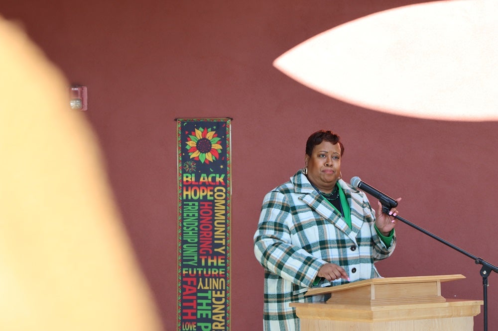 Bev Redmond speaks at black history month flag raising