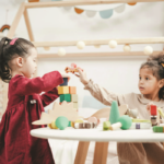 Preschool students playing with blocks