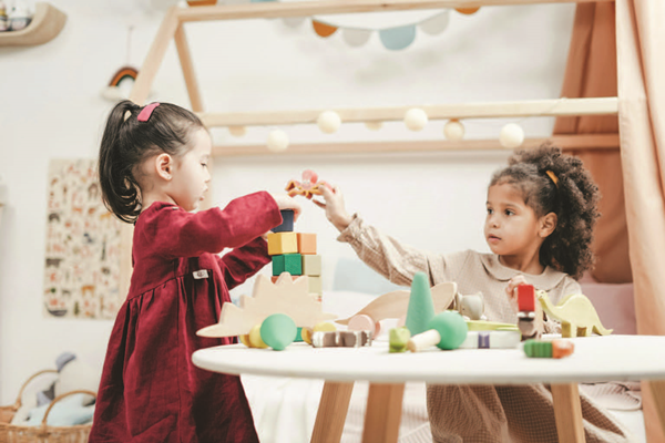 Preschool students playing with blocks