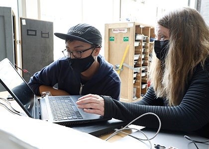 Student working at ta computer