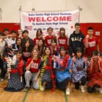 Nathan Hale and students from Japan in the gym.