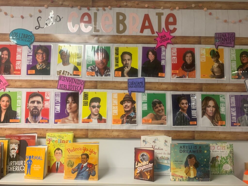 wall of books featuring important Hispanic figures and authors