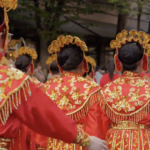 Chinatown Drill team in traditional dress.