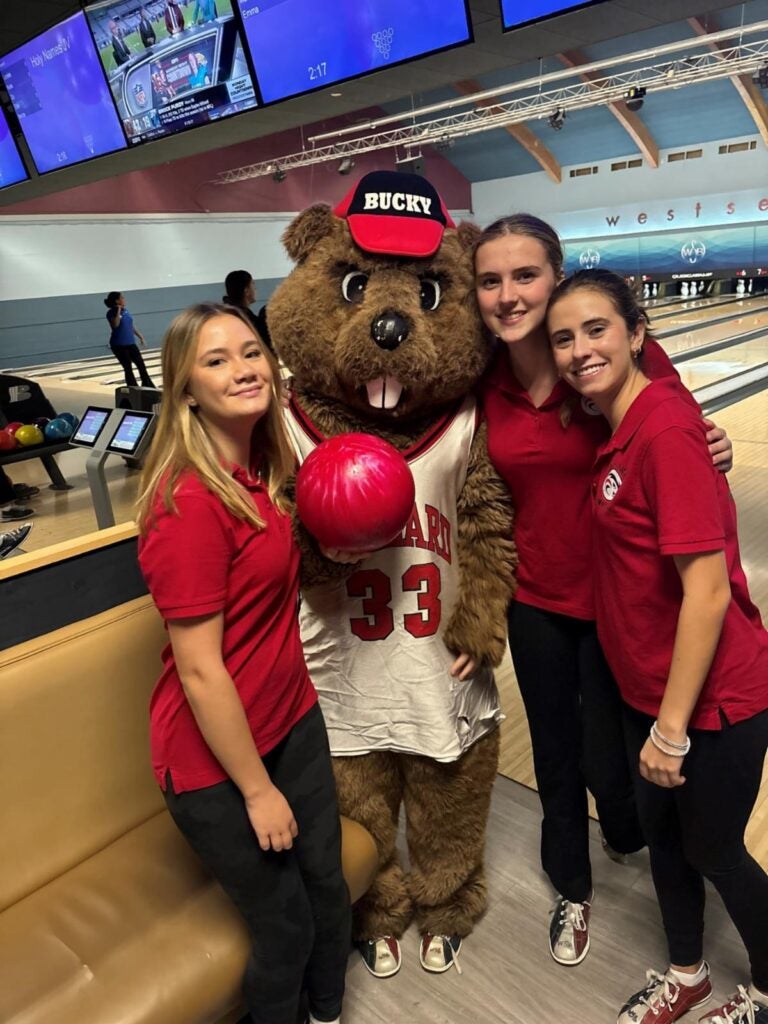 Student bowlers with Bucky the Beaver